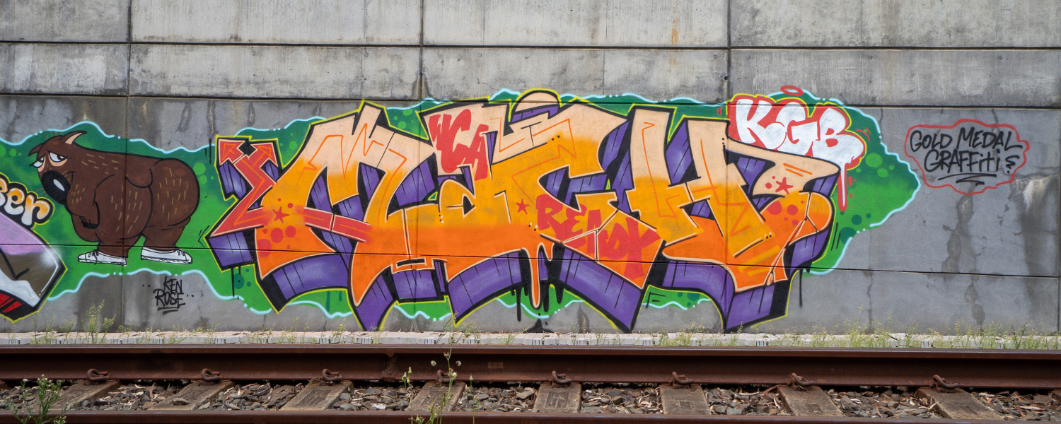 MACH Gold medal graffiti
